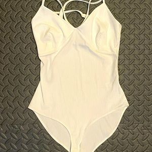 Small white Material Girl bodysuit